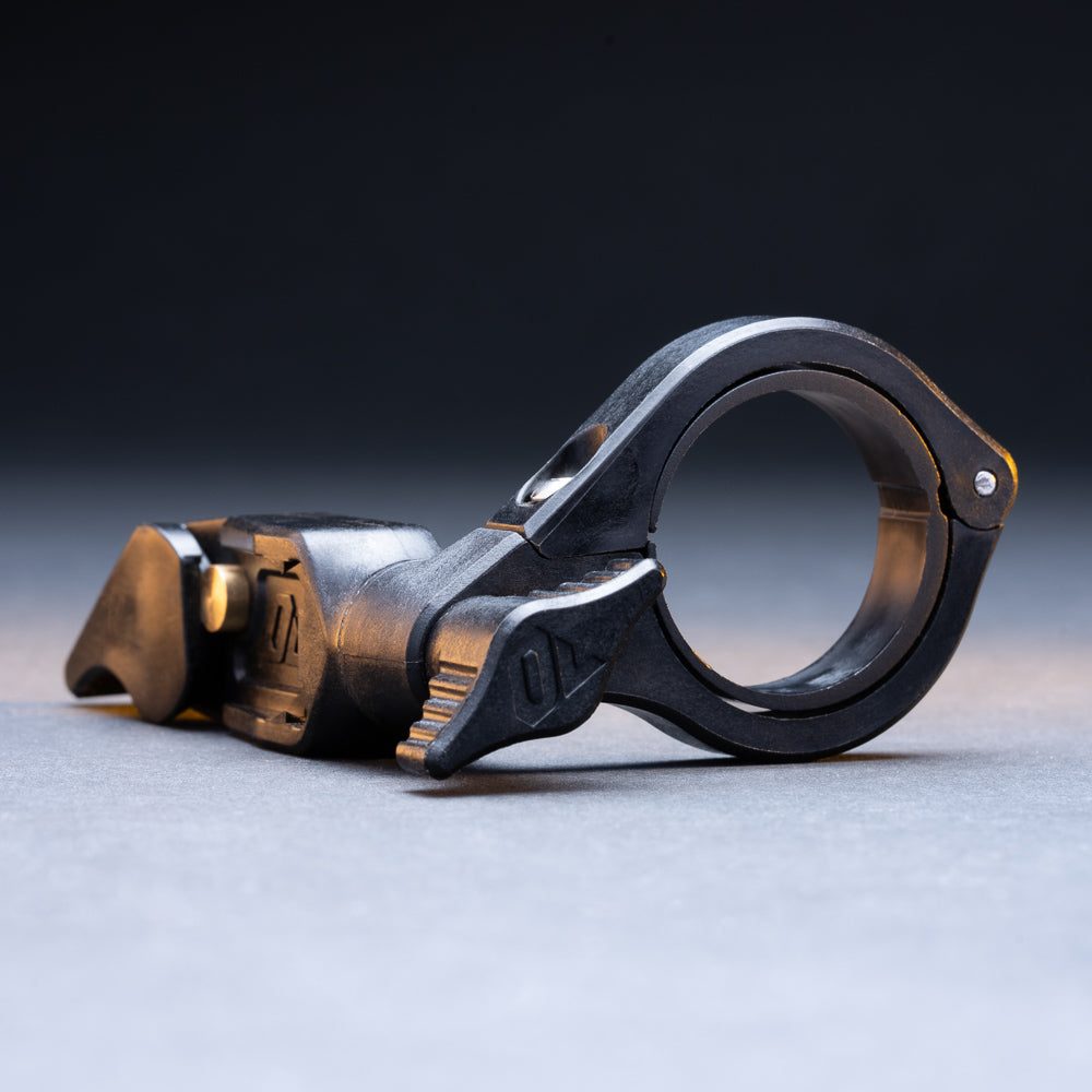 Quick release handlebar mount clamp for bike lights, three-quarter view